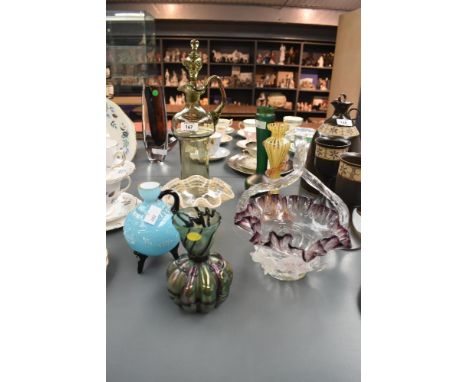 An unusual vintage continental hand blown glass decanter with original stopper, 34cm, sold together alongside a small green l