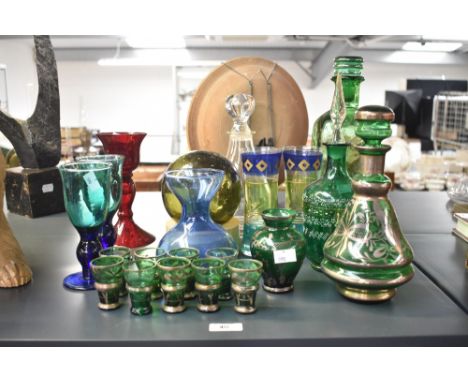 A good selection of vintage glass including a Czech decanter set, a ruby red goblet and green glass fishing float ect. Larges