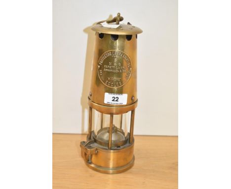 An Unused brass Protector Lamp &amp; Lighting Company miners lamp, type 6. 25cm