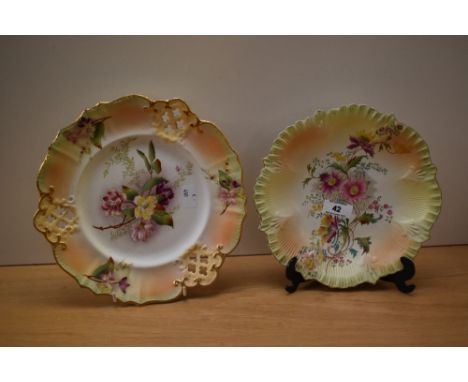 A pair of late 19th / early 20th century Carlton Ware porcelain blush ivory cabinet dishes decorated with flowers in the Roya