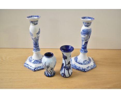 A late 20th century Moorcroft Florian Ware vase by designer Anji Davenport, of waisted form, decorated with dark blue flowers