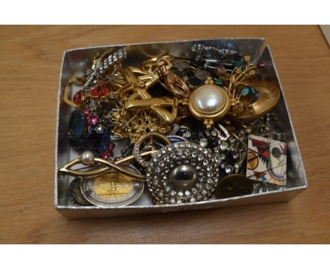 An assortment of costume brooches, including Monet, paste set examples and statement pieces etc