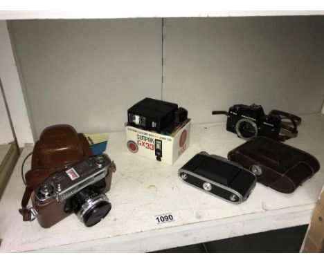 A quantity of old camera's including Yashica, Praktica (no lens) a Sunpak GX33 flash &amp; 1 other camera ****Condition repor