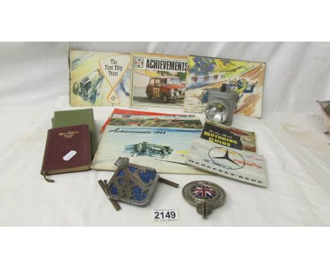 A quantity of Shell and other motoring books, 2 RAC badges, cycle lamp etc.,