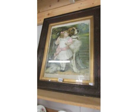 A framed and glazed 19th century print of a girl with a St. Bernard dog.