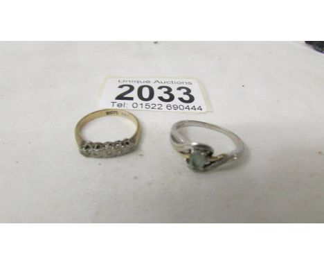 A 9ct gold and diamond ring, size L and a silver ring, size N.