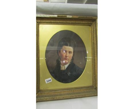 A framed and glazed oval portrait of a lady (frame a/f), image 35 x 27 cm, frame 56 x 48 cm.