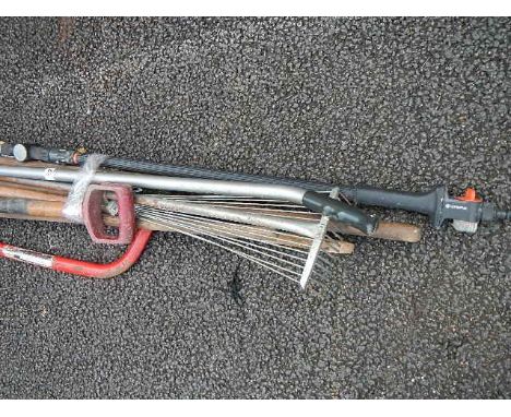 A quantity of assorted garden tools.