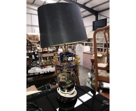 A large blue &amp; gilded classical design table lamp