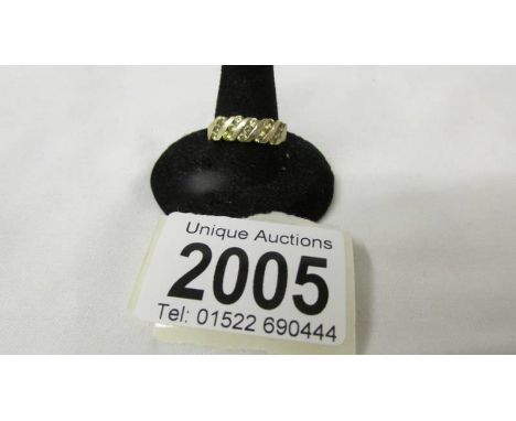 A stone set ring marked 375, size O, 3.2 grams.