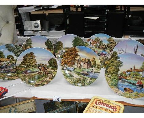 A set of 8 Royal Worcester canal scene collector's plates.