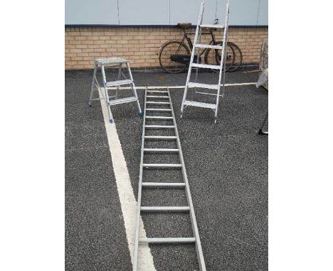 An aluminium ladder and 2 aluminium step ladders.