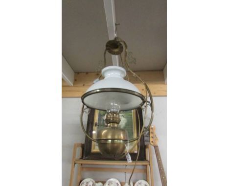 A hanging oil lamp converted to electric complete with shade and chimney. 