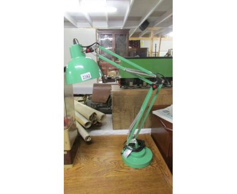 A modern angle poise reading lamp.