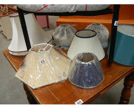 A quantity of lamp shades including new.