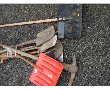 A quantity of assorted garden tools.