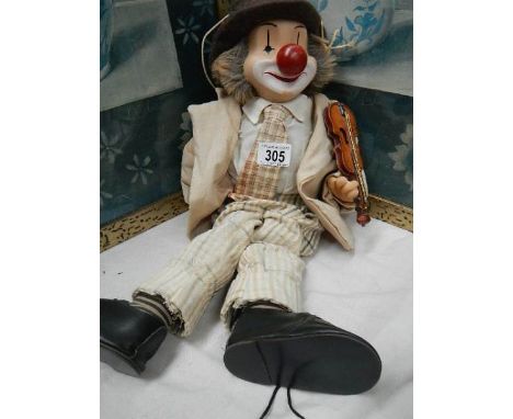 A vintage clown puppet.