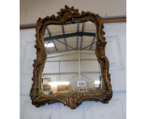 A vintage reproduction ornate decorative Chippendale style mirror 55cm x 37cm