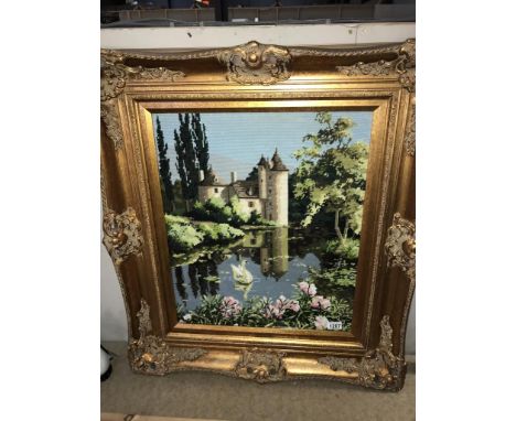 A fabulous gilt framed wool work tapestry of a French castle reflected in a lake by Philippa Eminson (87cm x 76cm)