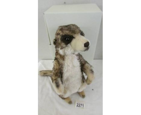 A boxed Steiff meercat. in very good condition.
