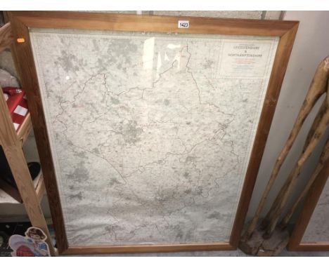 A large pine framed ordnance survey map of Leicester and Northamptonshire 106cm x 132cm