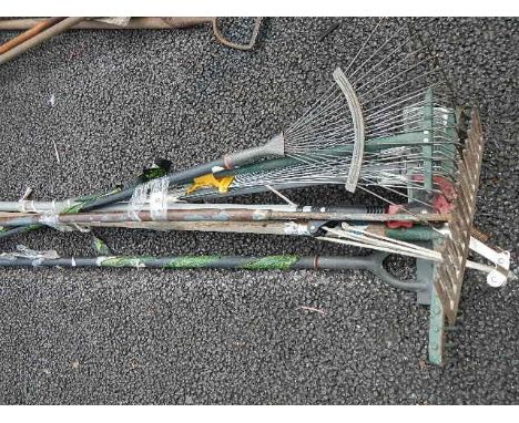 A quantity of assorted garden tools.