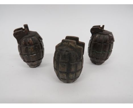Three Various Inert Mills Grenadesconsisting No 36 example.  Alloy base plug stamped “No36M MK1 WDC. 40”.  Damage to top.  No