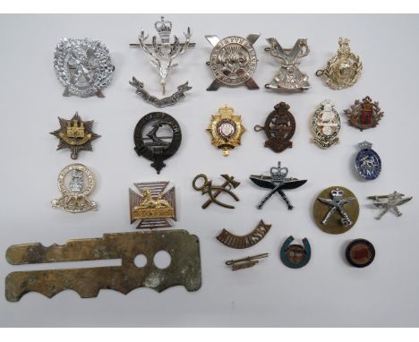 Small Selection of Various Badgesincluding plated Highland Brigade ... Plated Lowland Brigade ... QC 3 part plated Queens Own
