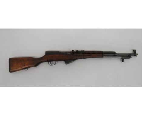 Deactivated Communist Simdnov SKS Assault Rifle20 1/4 inch, 7.62 mm, blued barrel with lower hinged, cruciform bayonet.  Blue