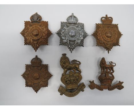 Small Selection of Royal Marine Badgesconsisting KC brass and silvered RMLI Plymouth Division 1920-1923 helmet plate ... KC c