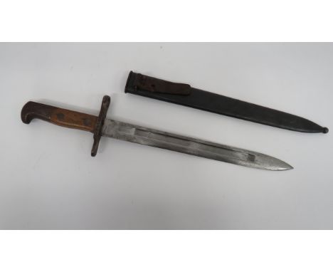 Swiss M1889/99 Schmidt Rubin Bayonet11 3/4 inch, single edged blade with central locking fuller.  Forte marked “Waffenfabrik 
