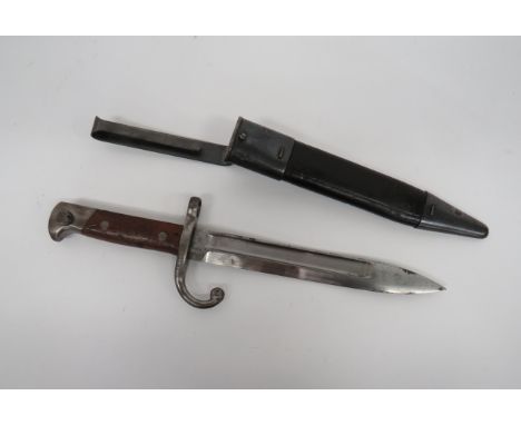 Scarce Mexican Contract M1897 Remington Bayonet8 1/4 inch, single edged blade with unmarked fuller.  Steel hook quillon, muzz