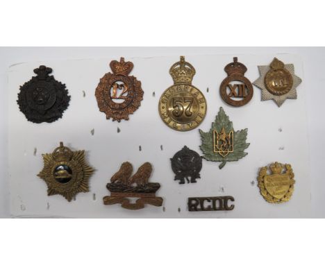 Small Selection of Canadian Badgescap badges include KC brass 57th Canadian Militia glengarry ... Brass and blackened 1st Bri