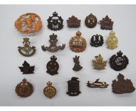 Selection of Canadian Cap Badgesincluding KC gilt 3rd Toronto Reg ... KC bronzed Royal Montreal Reg (lugs) ... White metal 16