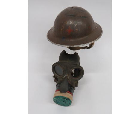 WW2 Civil Defence Red Cross Helmetkhaki painted crown.  The front with painted red cross with surrounding letters “*** M.A.P.