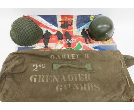 Small Selection of Grenadier Guards Northern Ireland Itemsconsisting green painted, turtle pattern helmet with netting cover.