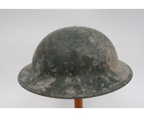 WW1 American Pattern Brodie Helmetgreen, repainted, rough texture, low crown helmet.  Turned edge brim.  Black treated linen 