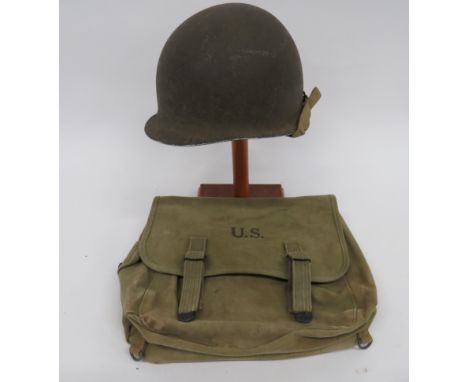 WW2 American Front Seam Helmetgreen, rough texture, outer shell.  Lower brim with front seam.  Small stress fracture to the f