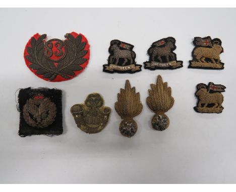 Small Selection of Bullion Embroidery Badgesincluding 83 within a wreath, possibly altered at top .. DLI strung bugle ... QC 