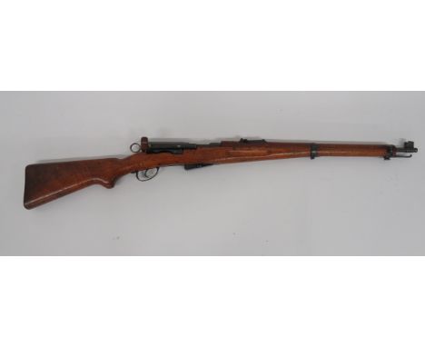 Swiss M1911 Carbine23 1/4 inch, 7.5 mm, blued barrel.  Rear ladder sight.  Blued breech.  Straight pull bolt with large rear 