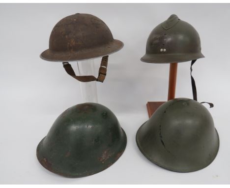 Selection of Various Steel Helmetsconsisting brass MKII example.  External khaki  finish (some rust).  Complete with treated 