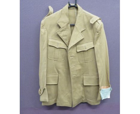 WW1/WW2 French Officer’s Tropical Tuniclight khaki tan, Bedford cord, single breasted, open collar tunic.  Pleated chest pock