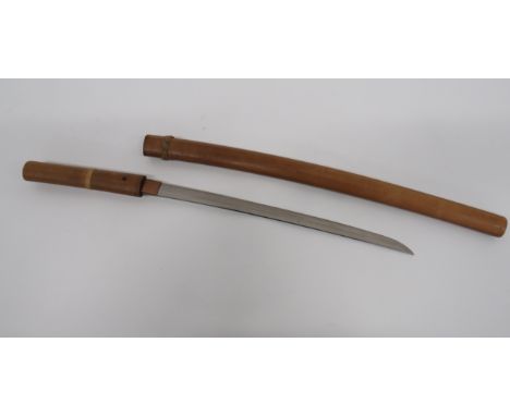 Japanese Sword Blade In Wooden Mount17 inch, single edged blade. Copper habaki. Tang with four figure signature. Plain wooden