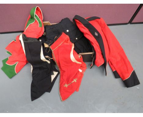 Royal Sussex Officer’s Mess Jacket and Waistcoatshort scarlet jacket with white edge piped black collar and cuffs.  The colla