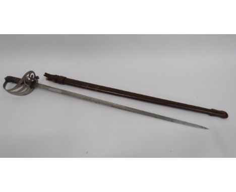 George V Light Infantry Officer’s Sword32 1/2 inch, dumb bell blade with central fuller.  Etched foliage panels.  Kings crown