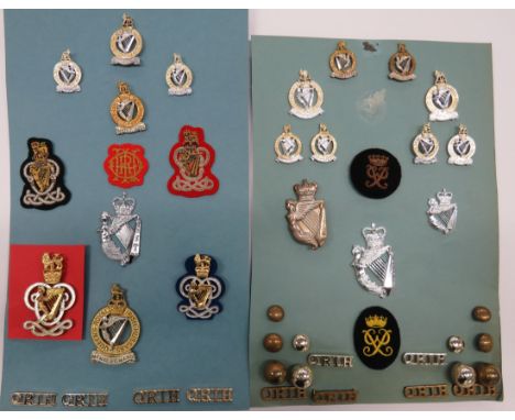 Selection of Queens Royal Irish Hussars Badgescap badges include QC bi-metal ... QC anodised ... Pair QC gilt and enamel coll
