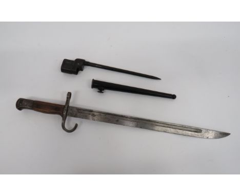 Japanese Arisaka Bayonet15 3/4 inch, single edged blade with fuller.  The forte with Armourer’s stamps.  Steel hook quillon, 