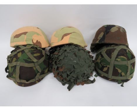 Six Various Modern Combat Helmetsconsisting 3 x British MK6 combat helmets.  Complete with liners, chinstraps and camo covers