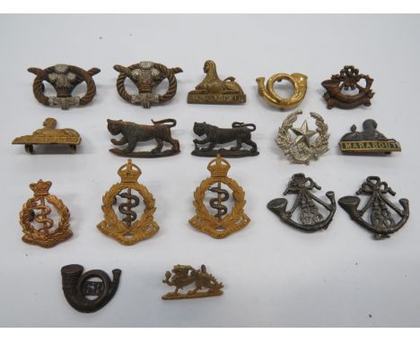 Small Selection of Collar Badgesincluding silvered, gilt and enamel Dorset Reg ... Gilt Manchester Reg ... Gilt Gordon Highla