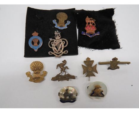 Small Selection of Lapel Badgesincluding silver hallmarked Queens Own Hussars ... Brass Royal West Kent ... Gilt, enamel and 